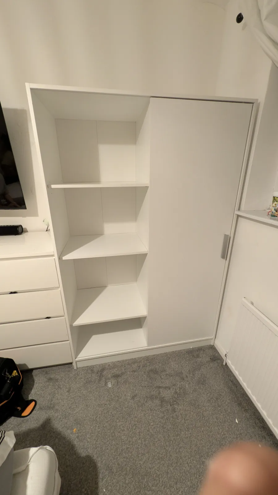 White sliding-door wardrobe assembled