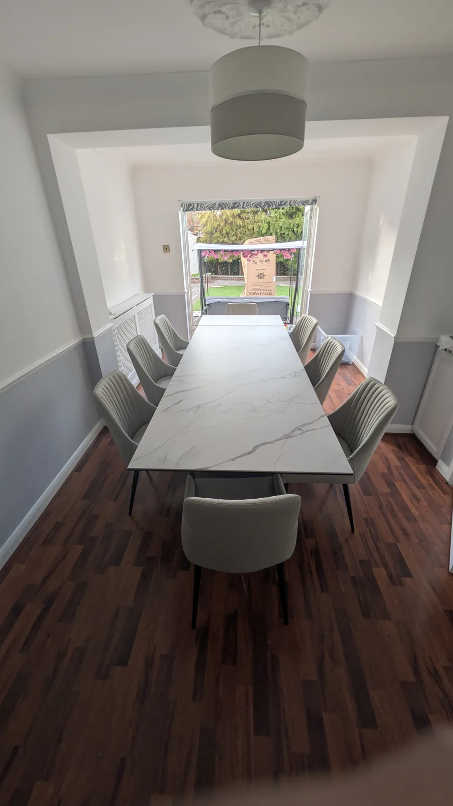 Marble-effect dining table and chairs assembled