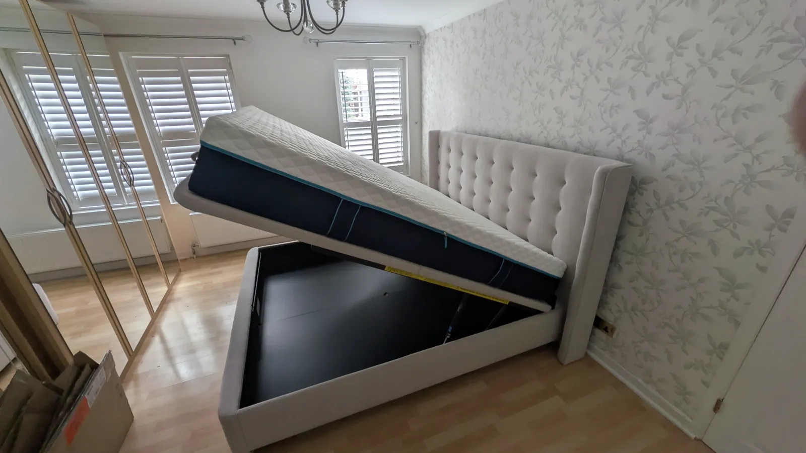 Ottoman storage bed assembled with lift-up base